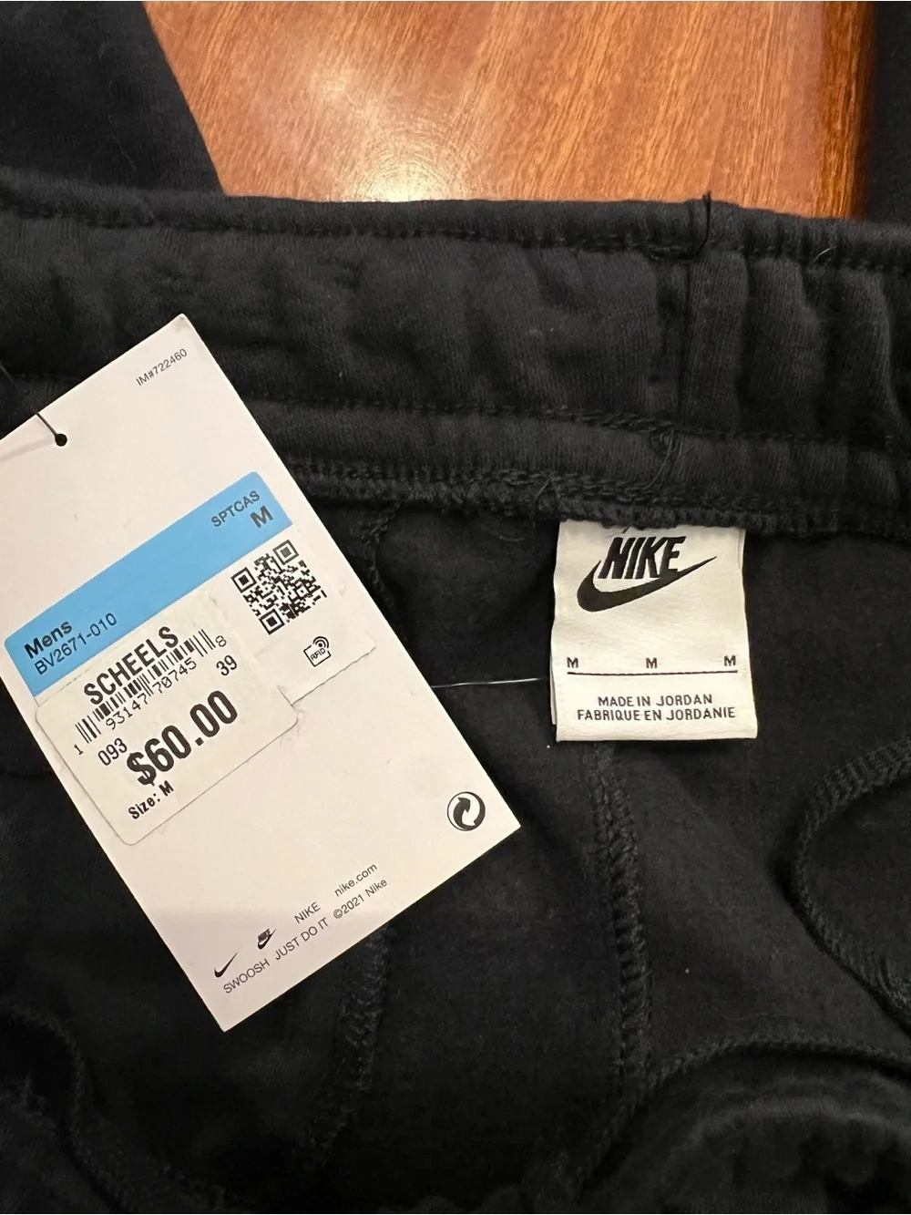 Nike Black Sweatpants with White Swoosh Logo